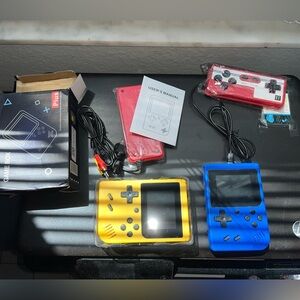 2 Brand New Game Boys With Remote, Adaptor And Charger